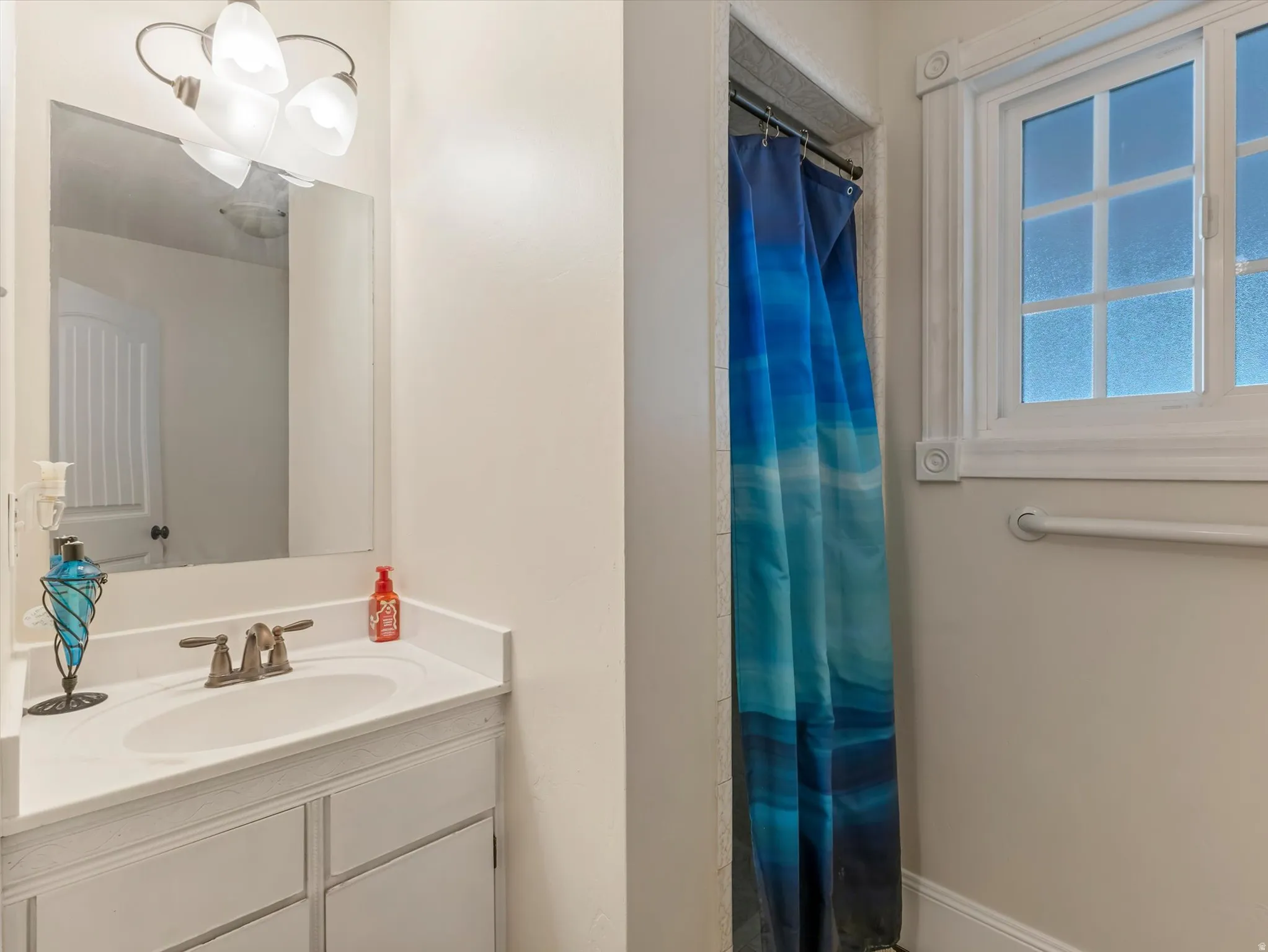 Bathroom off of laundry.
