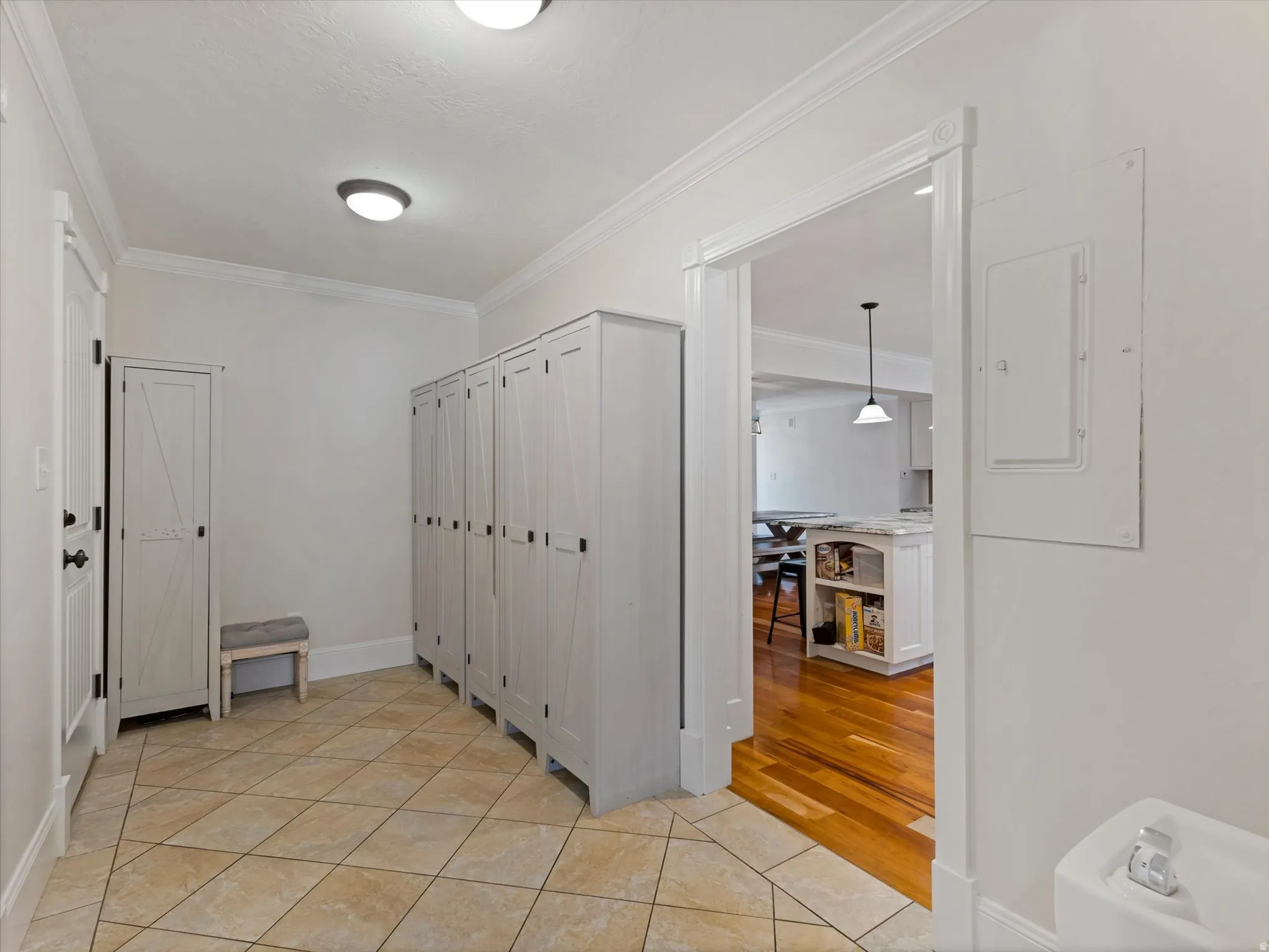 Mudroom between garage, back entrance and kitchen
