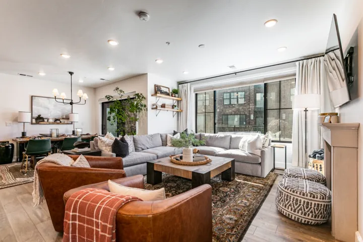 Living room featuring a chandelier and hardwood / wood-style floors