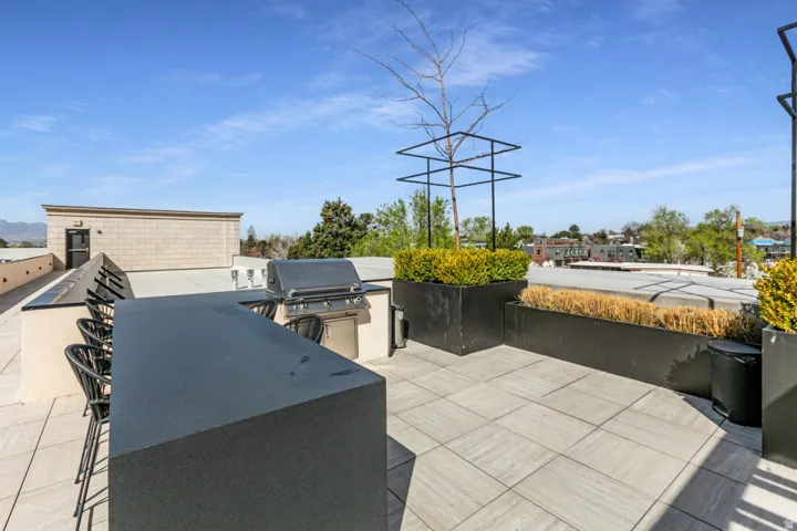 View of patio with exterior kitchen