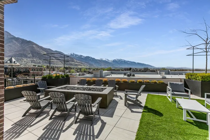 View of patio / terrace featuring a mountain view and an outdoor fire pit
