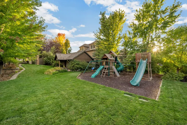 two-story playhouse & jungle gym