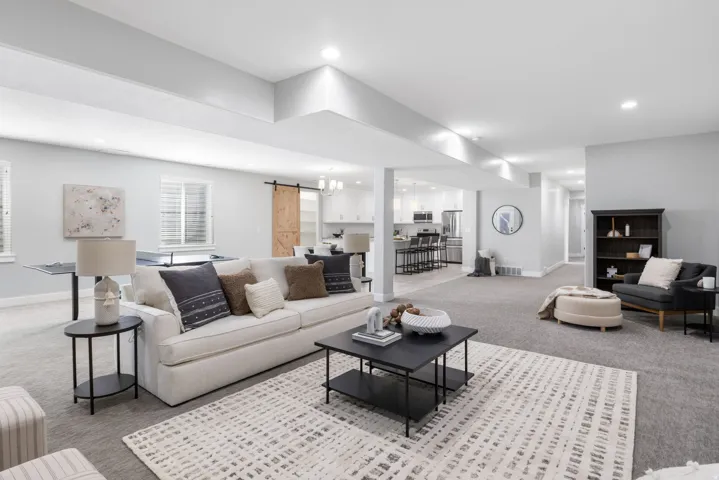 Family room with carpet, and recessed lighting