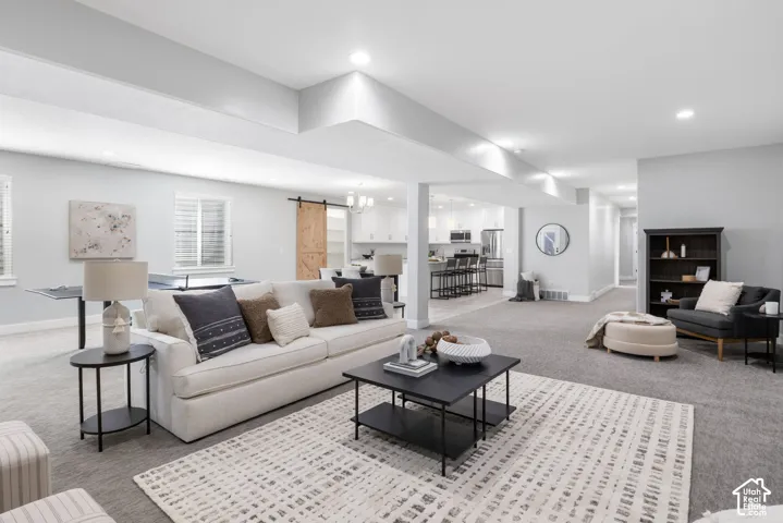 Family room with carpet, and recessed lighting