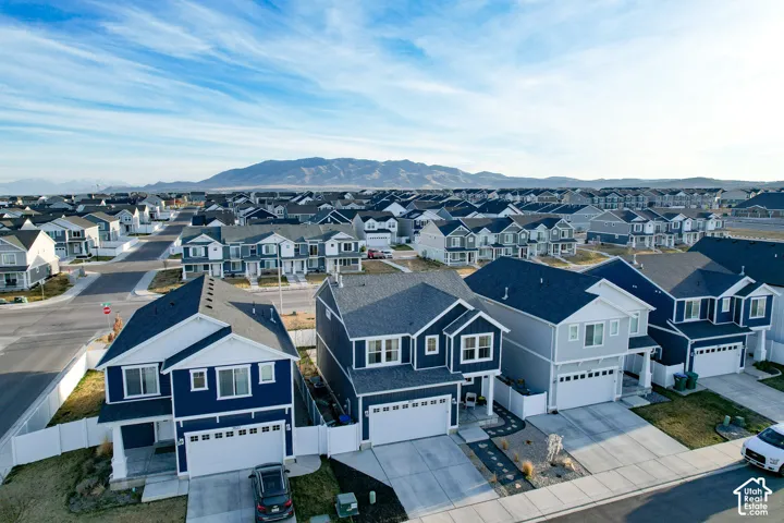 Aerial perspective of suburban area featuring a backdrop