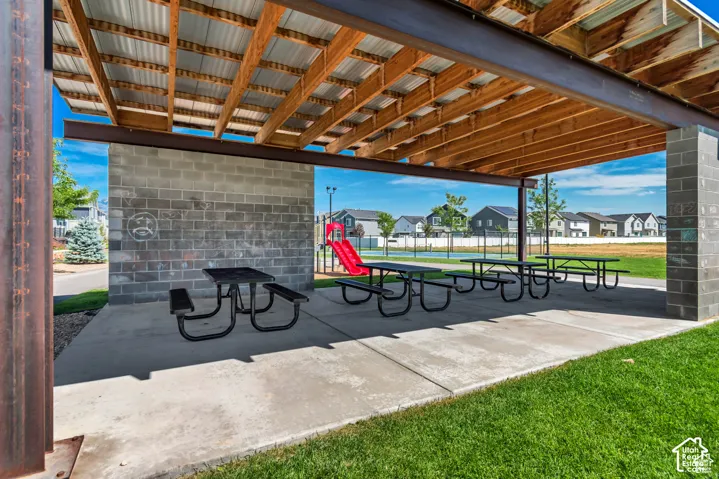 Surrounding community featuring a patio area and a residential view