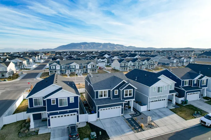 Aerial perspective of suburban area featuring a backdrop
