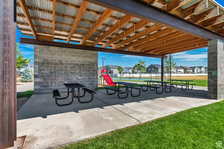 Surrounding community featuring a patio area and a residential view