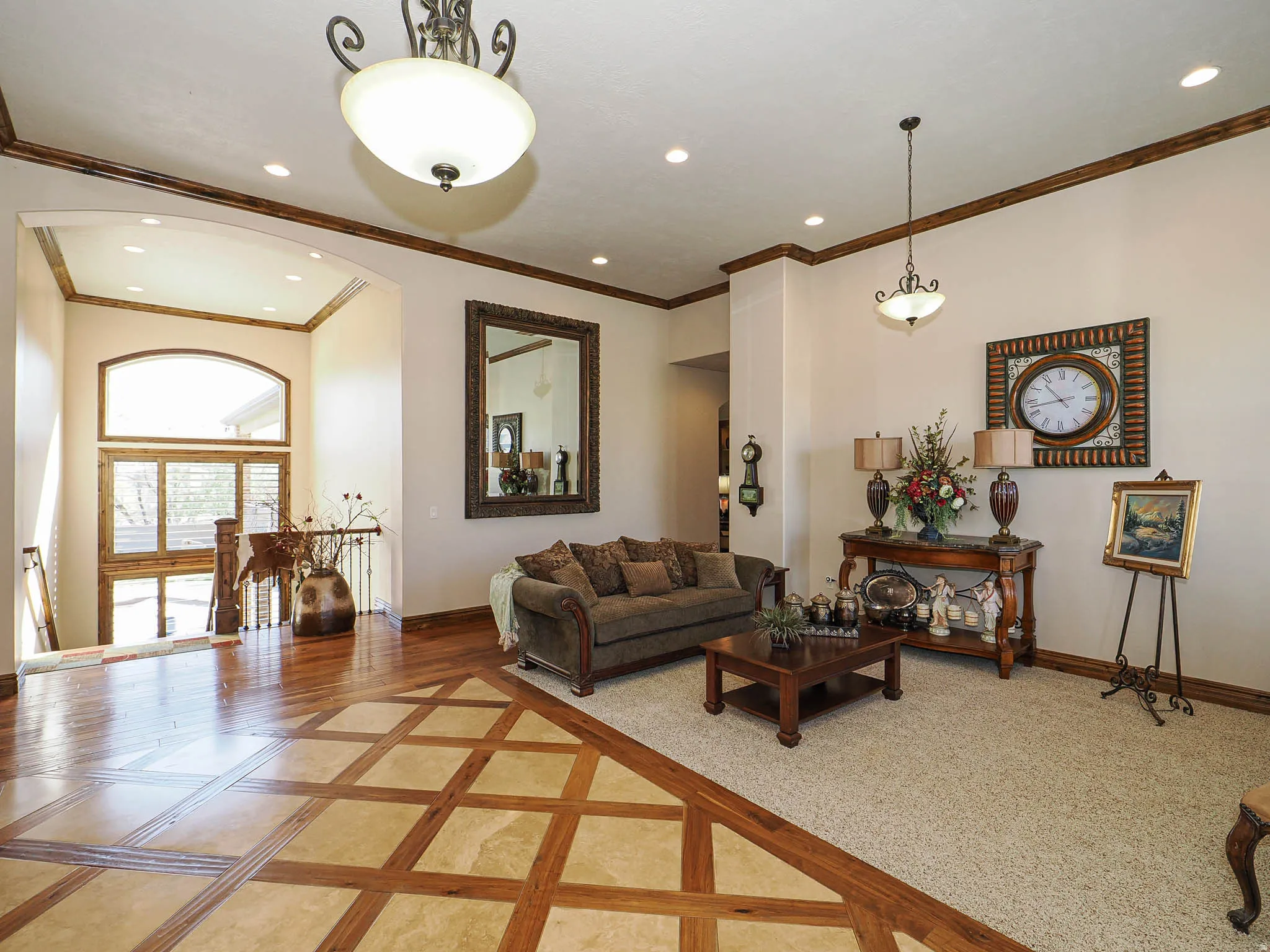 Entryway featuring a decorative inlaid wood and tile flooring pattern