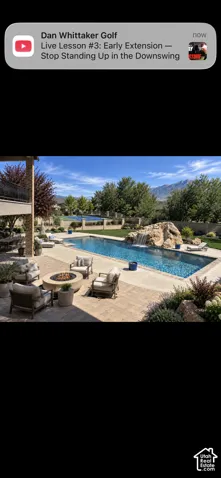 AI enhanced (pool closed for season) to show a pickleball court in the pasture area and slide and waterfall with repairs.