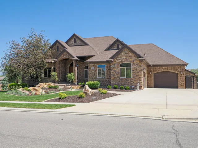 Stone and brick facade with an arched entry