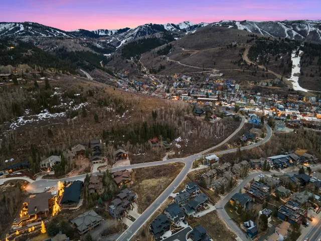 Aerial view at dusk of a mountain view and a residential view