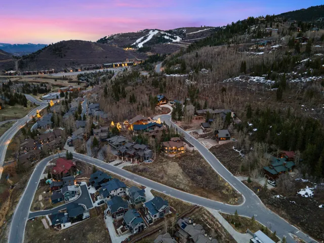 Aerial view at dusk of a mountain view and a residential view