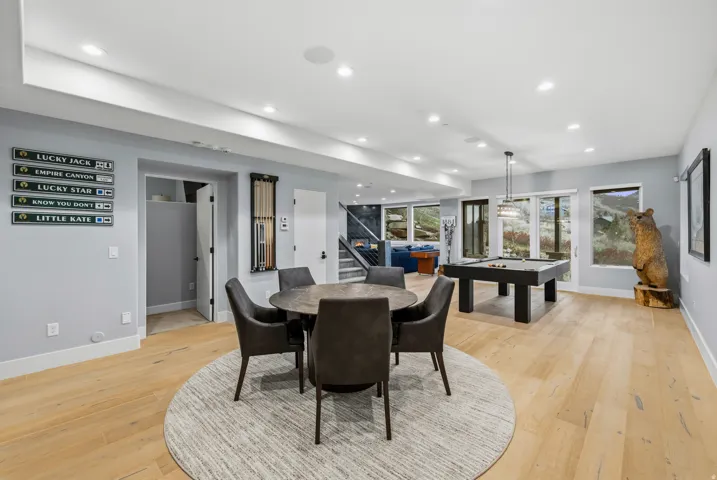 Dining area featuring billiards table, recessed lighting, and light wood-style floors