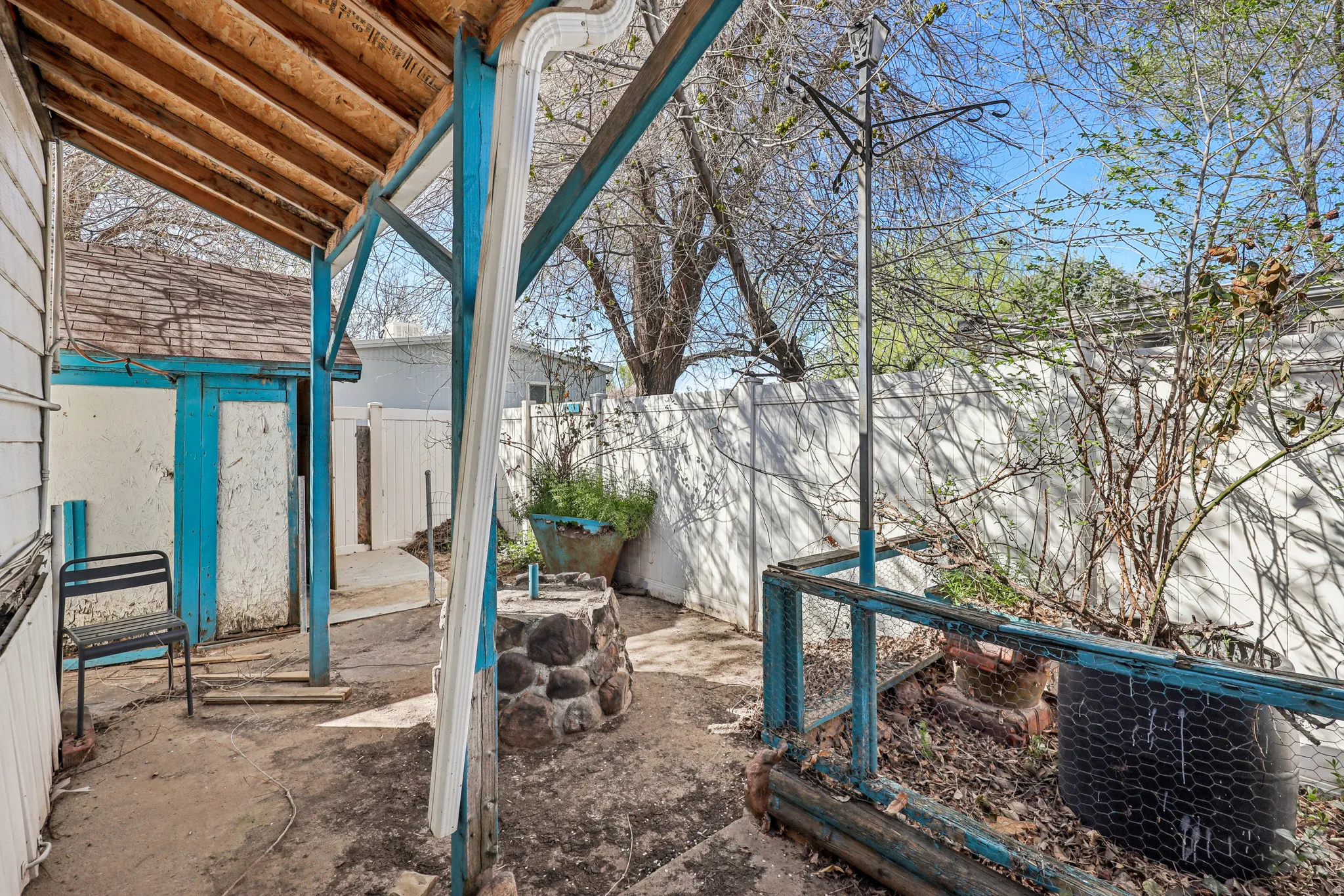 Fenced backyard with a patio area