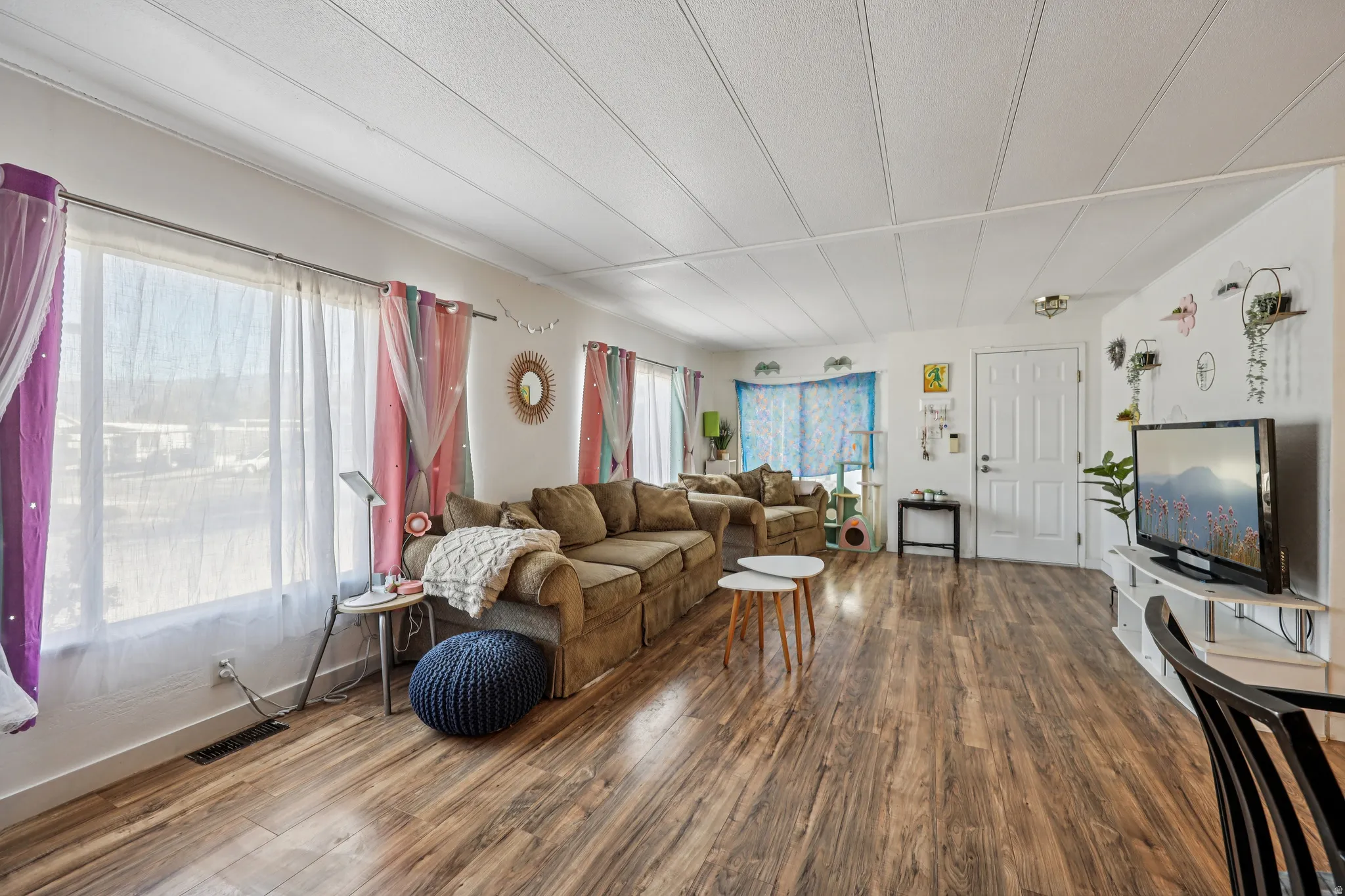 Living area featuring wood finished floors