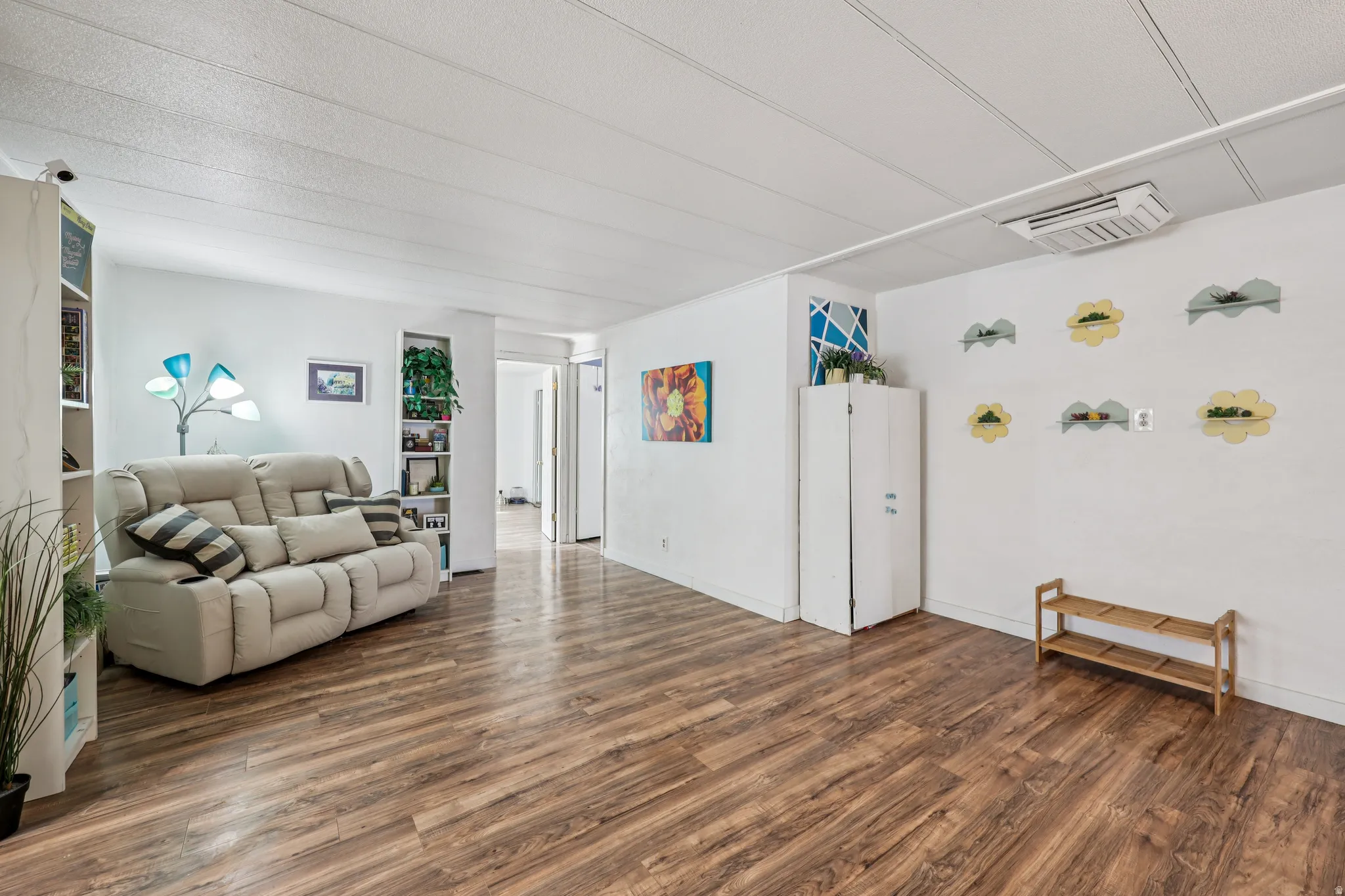 Living room featuring dark wood finished floors