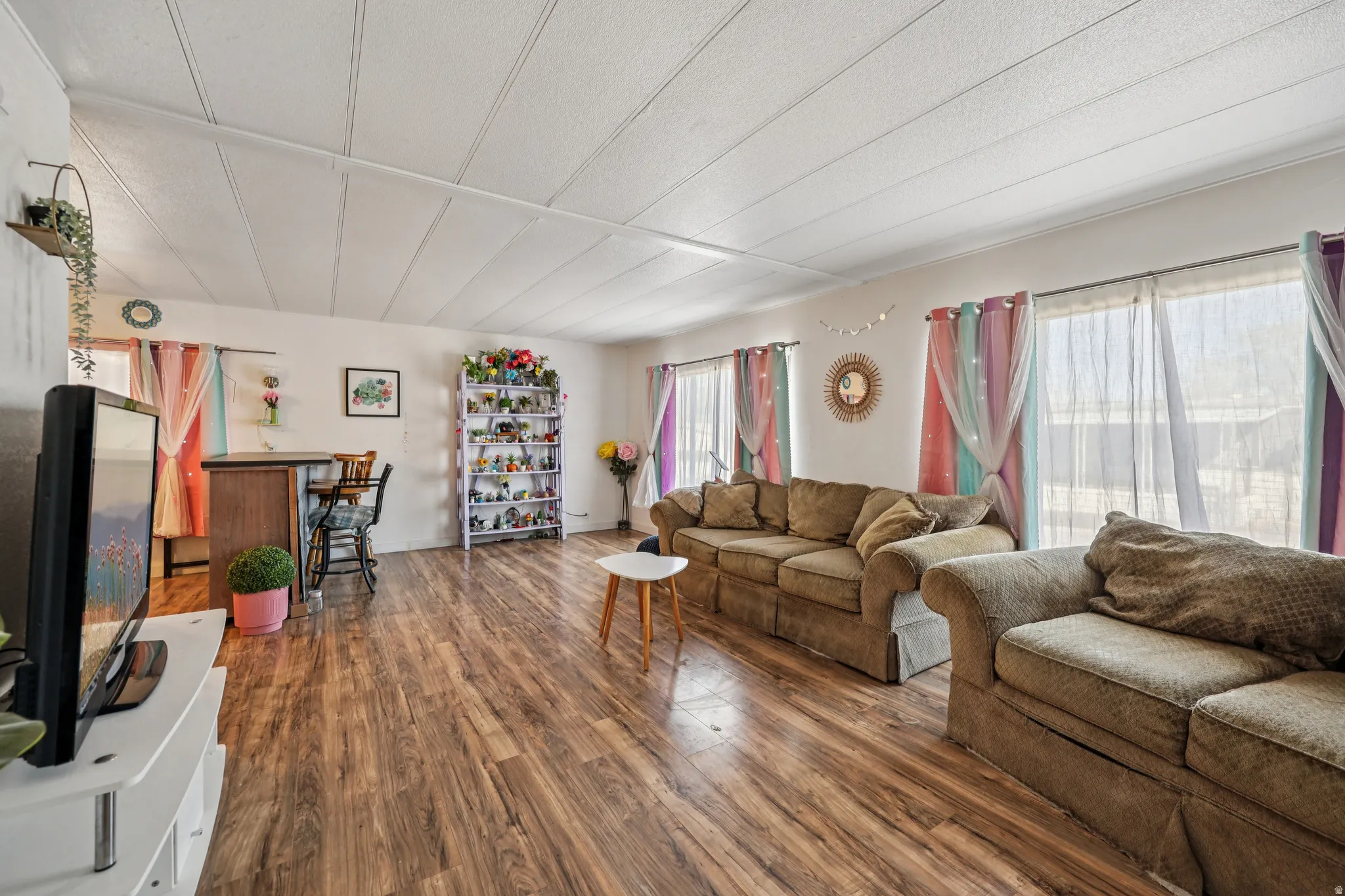 Living area with dark wood finished floors