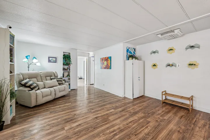 Living room featuring dark wood finished floors