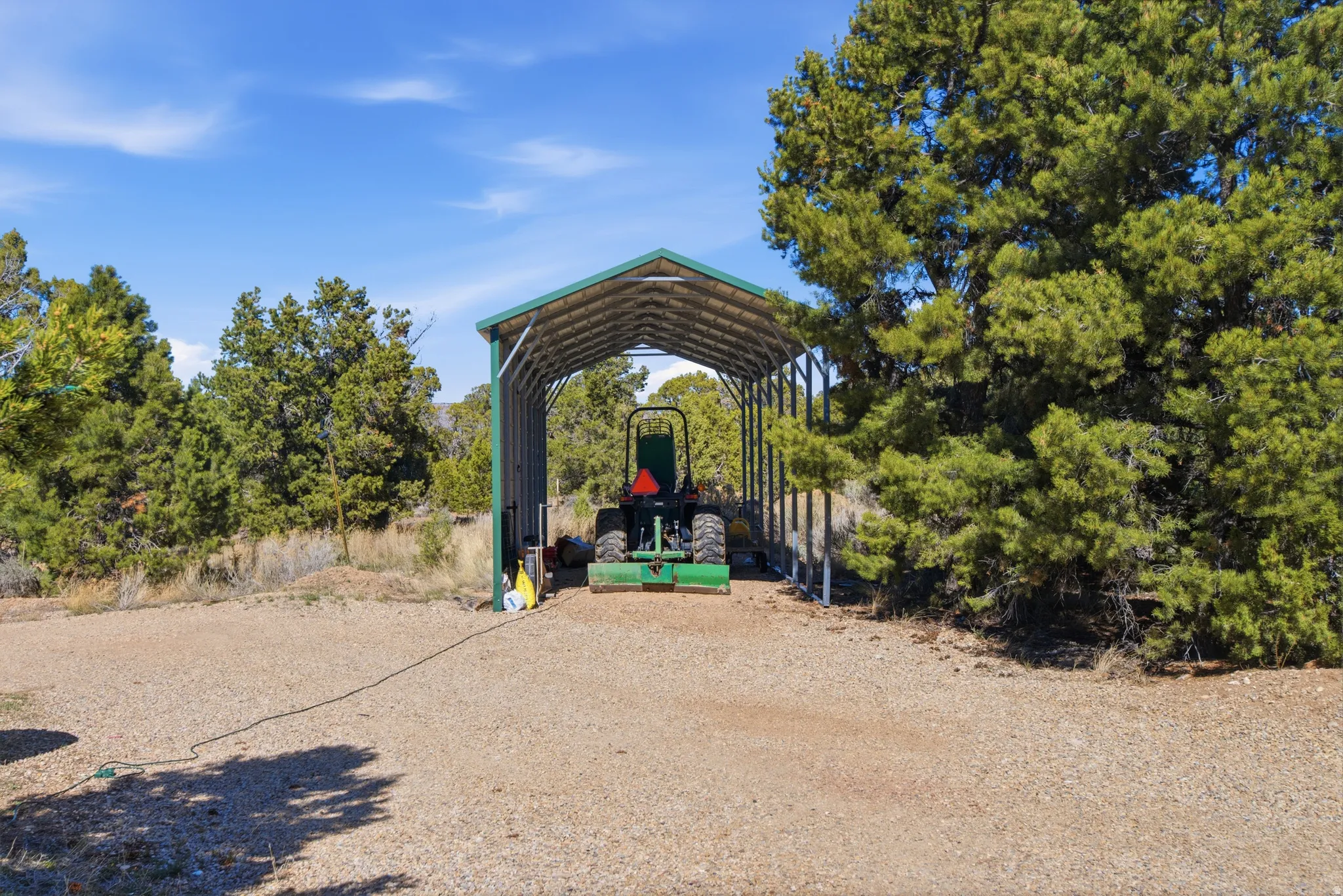 View of property's community with a carport and driveway
