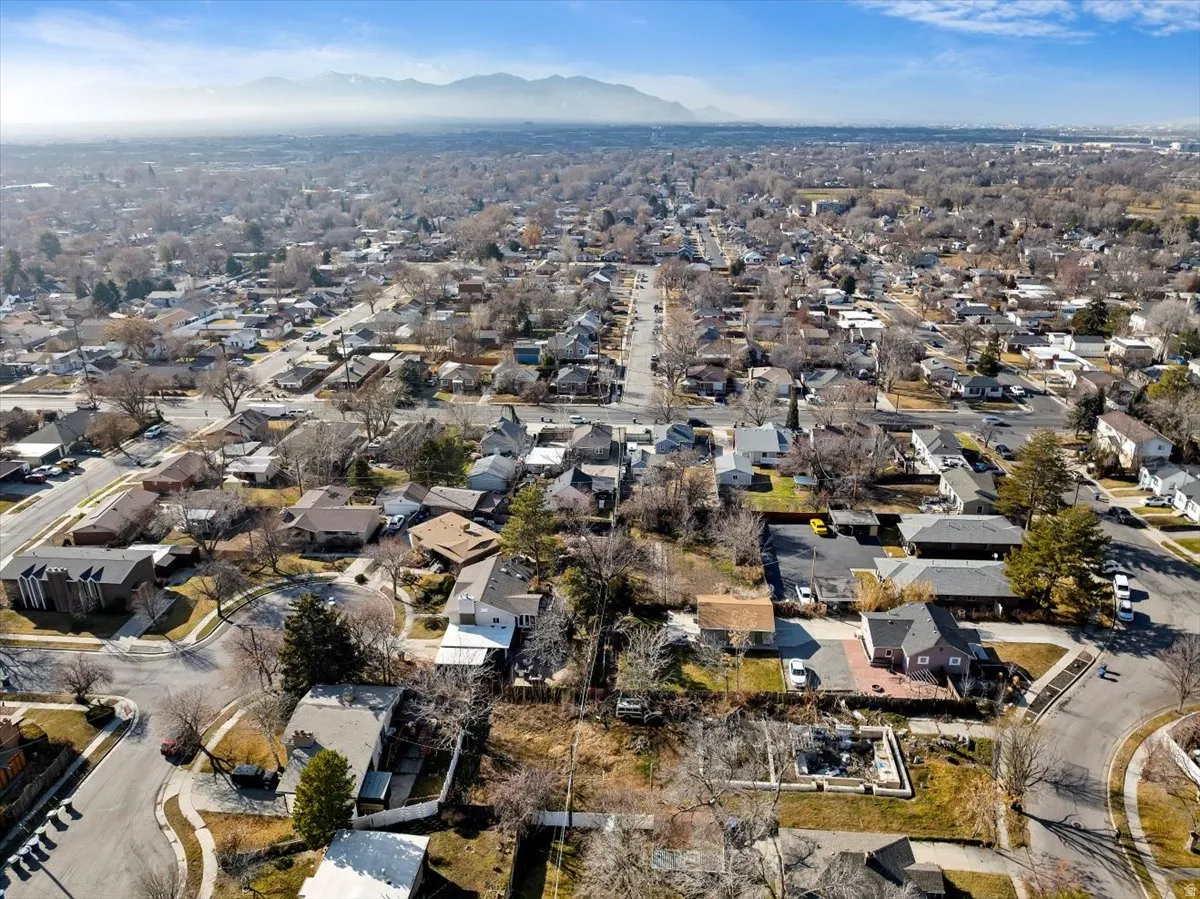 Aerial view of residential area with a mountain backdrop