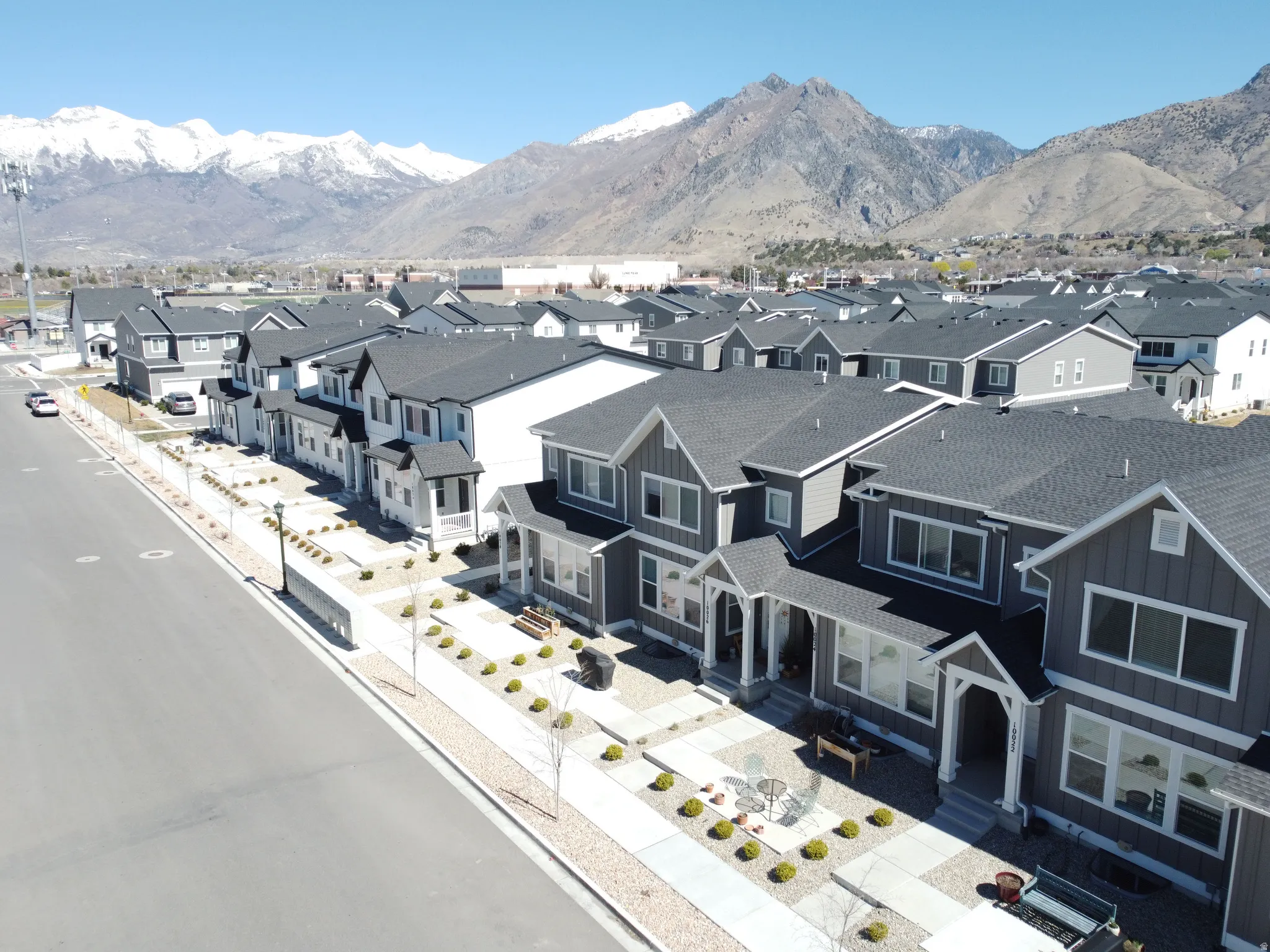 Aerial view of residential area with mountains