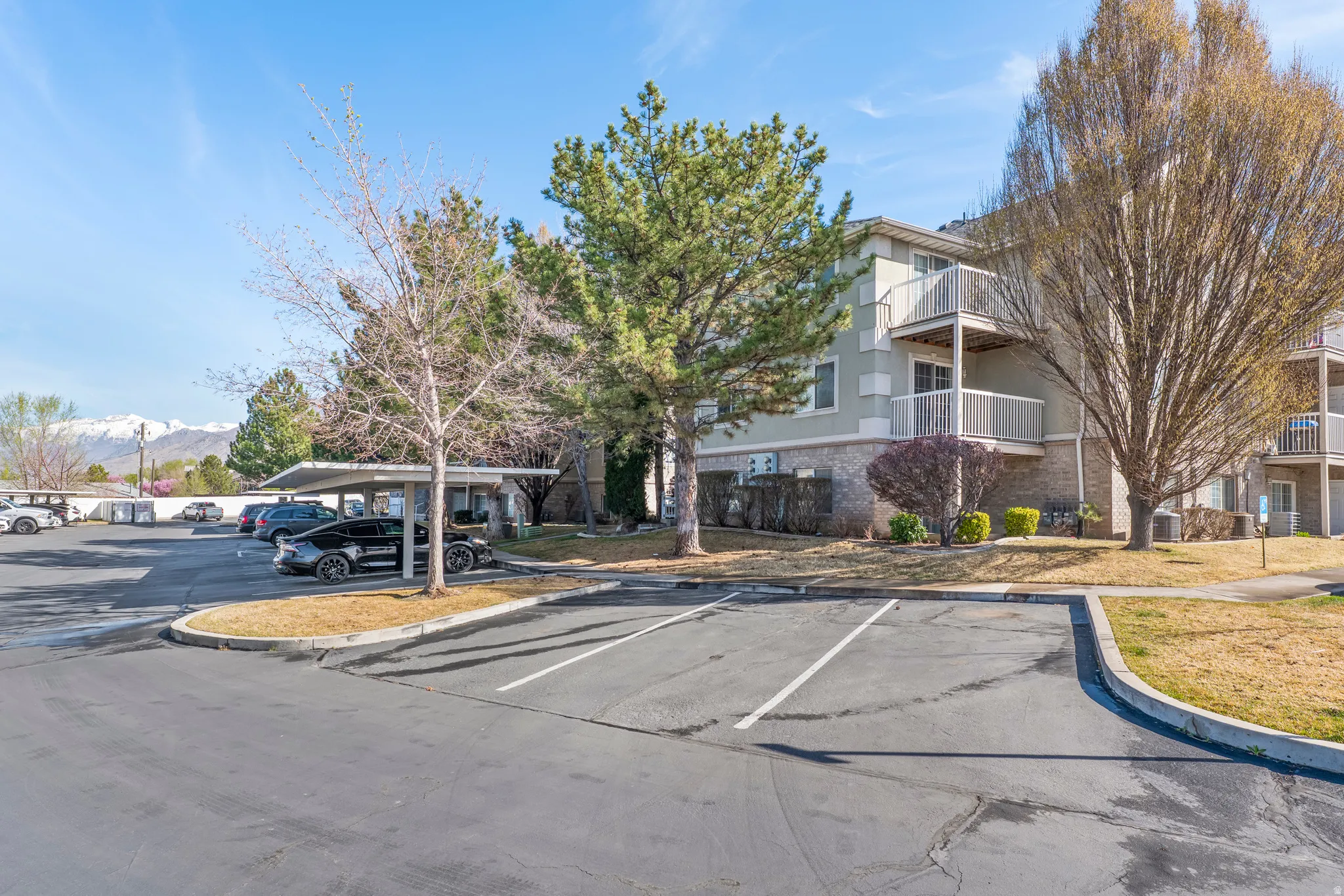Uncovered parking lot with a mountain view