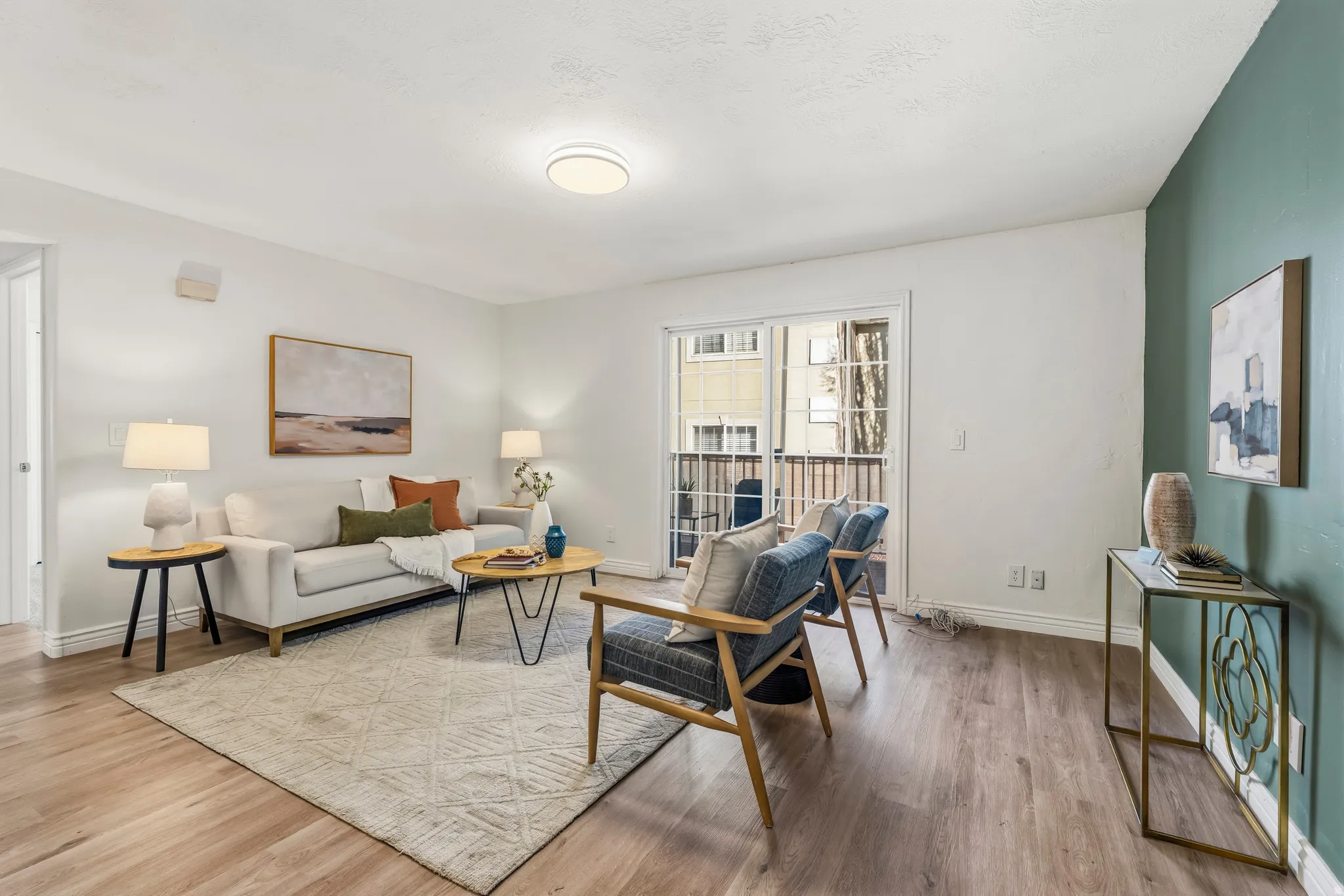 Living area featuring wood finished floors and baseboards