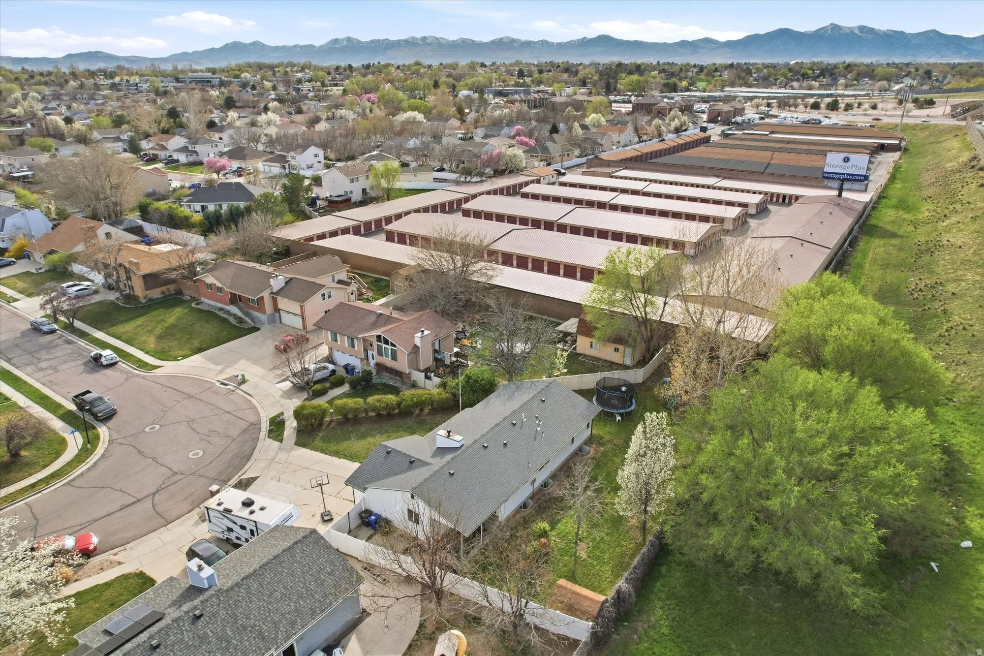 Aerial view of residential area with mountains