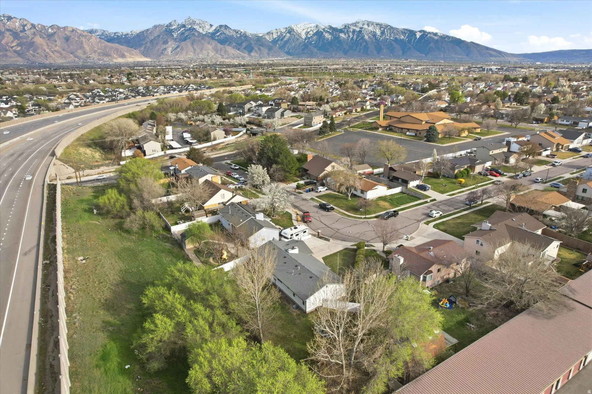 Aerial view of residential area with a mountainous background