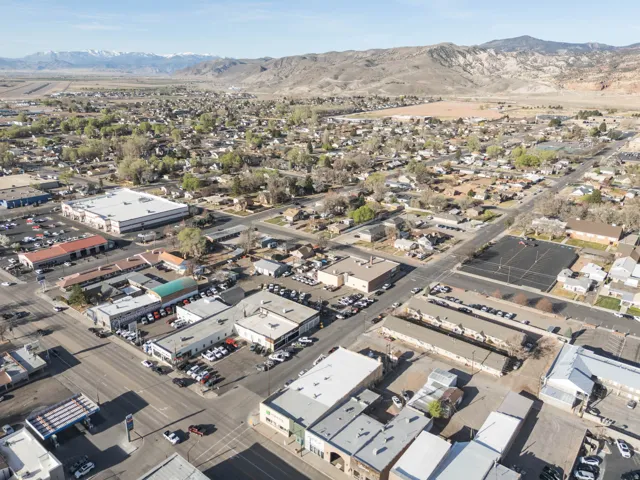 Aerial overview of property's location with a mountain backdrop
