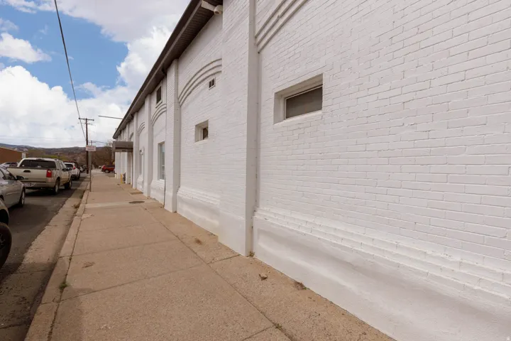 View of property exterior featuring brick siding