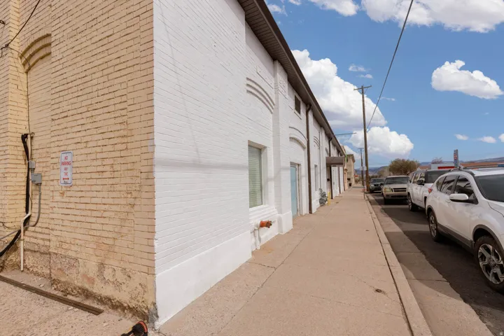 View of side of property with brick siding