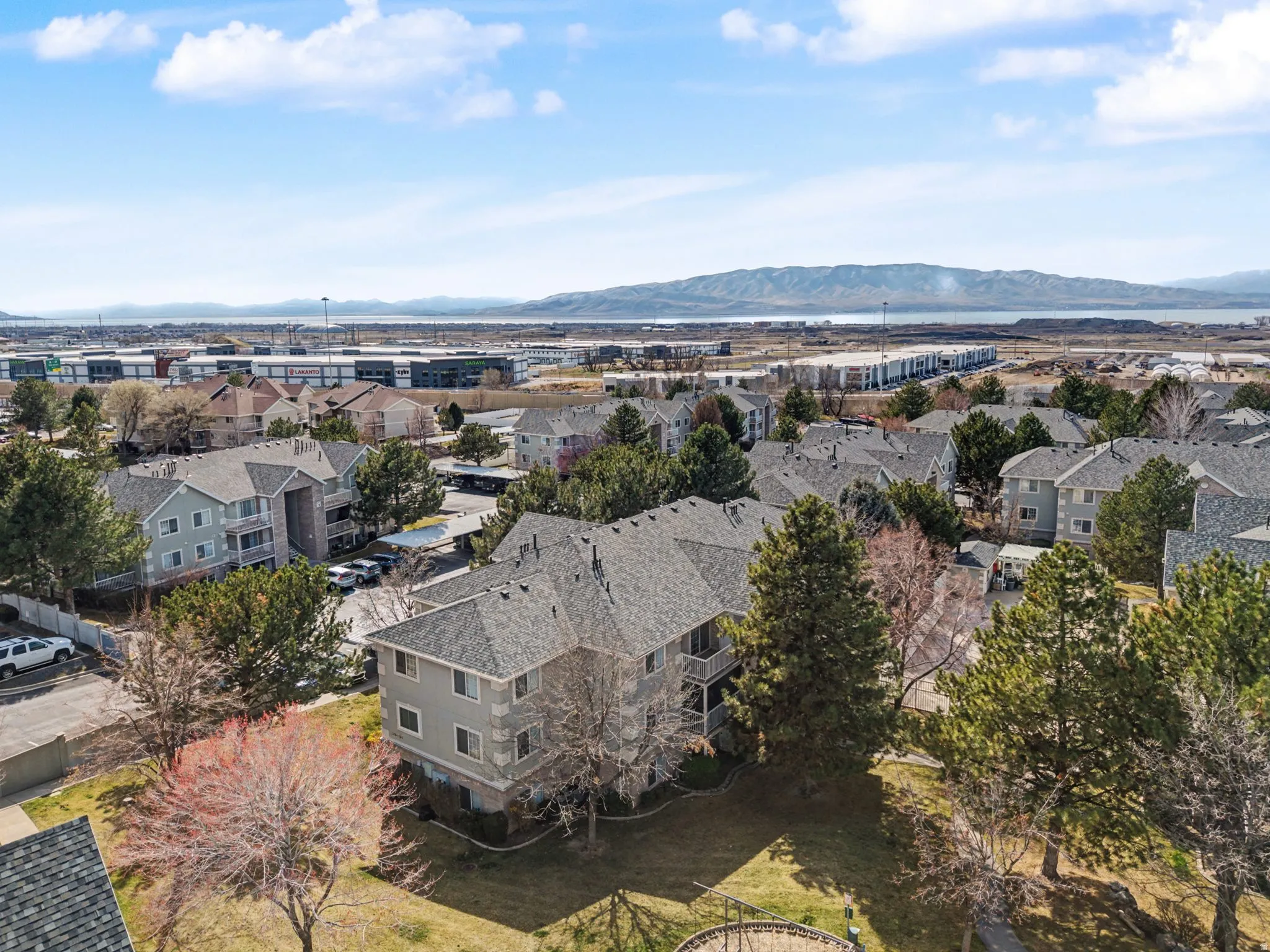 Aerial view of residential area with a mountainous background