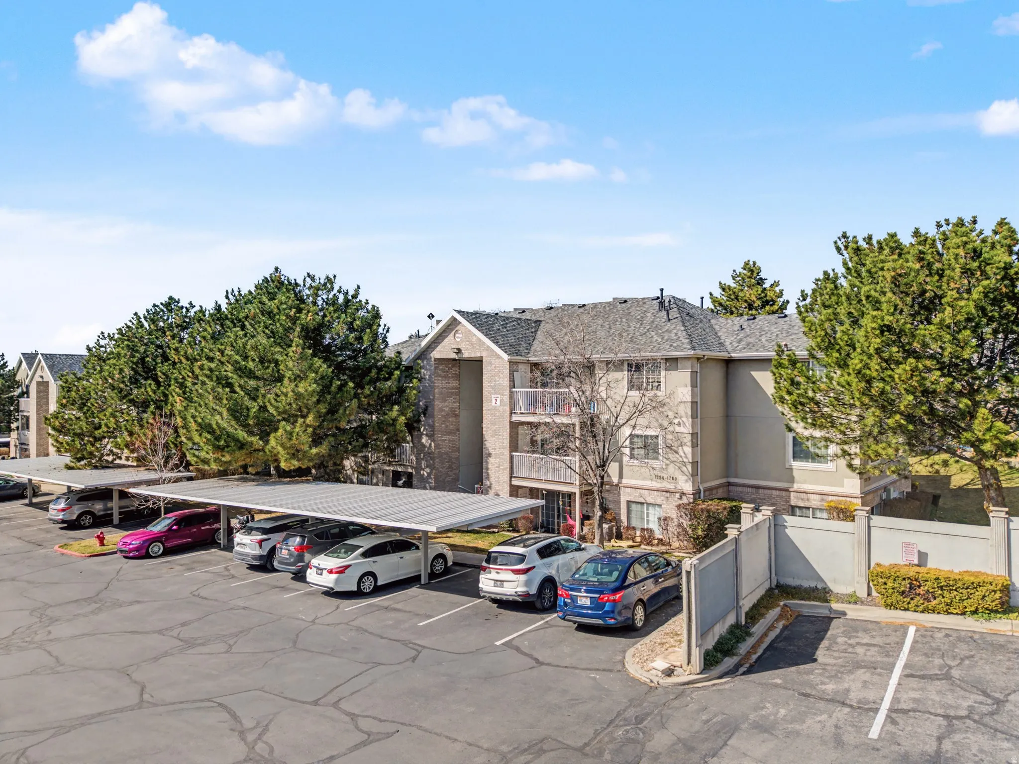 View of partially covered parking lot