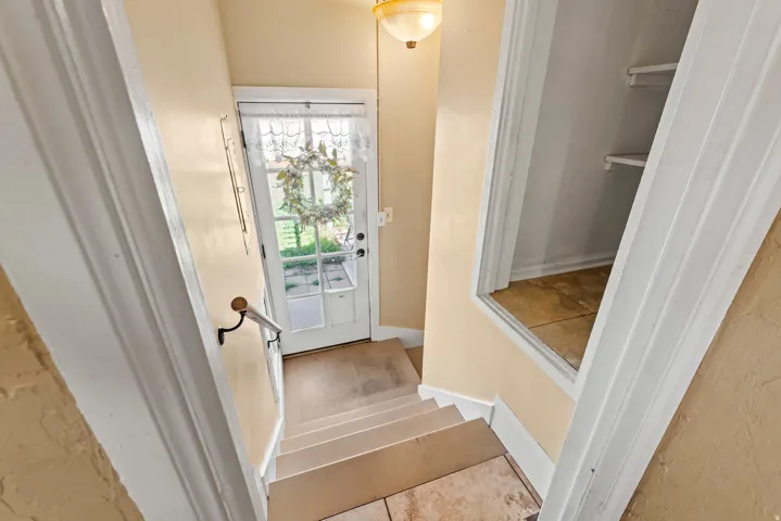 Stairs featuring baseboards