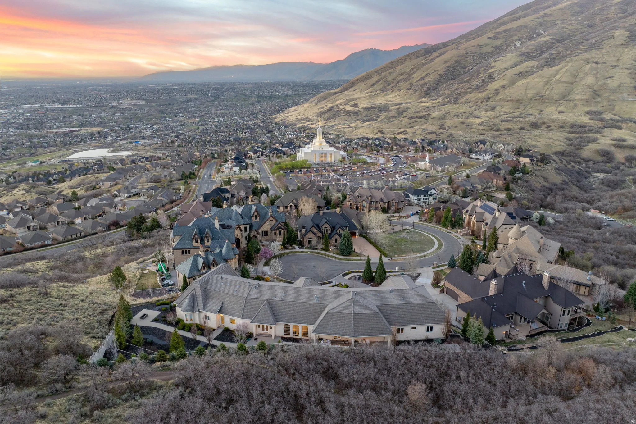 Aerial view at dusk of a mountain view and a residential view