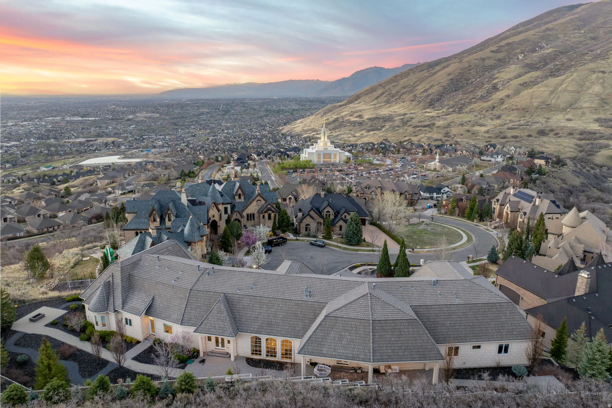 Aerial view at dusk of a mountain view and a residential view