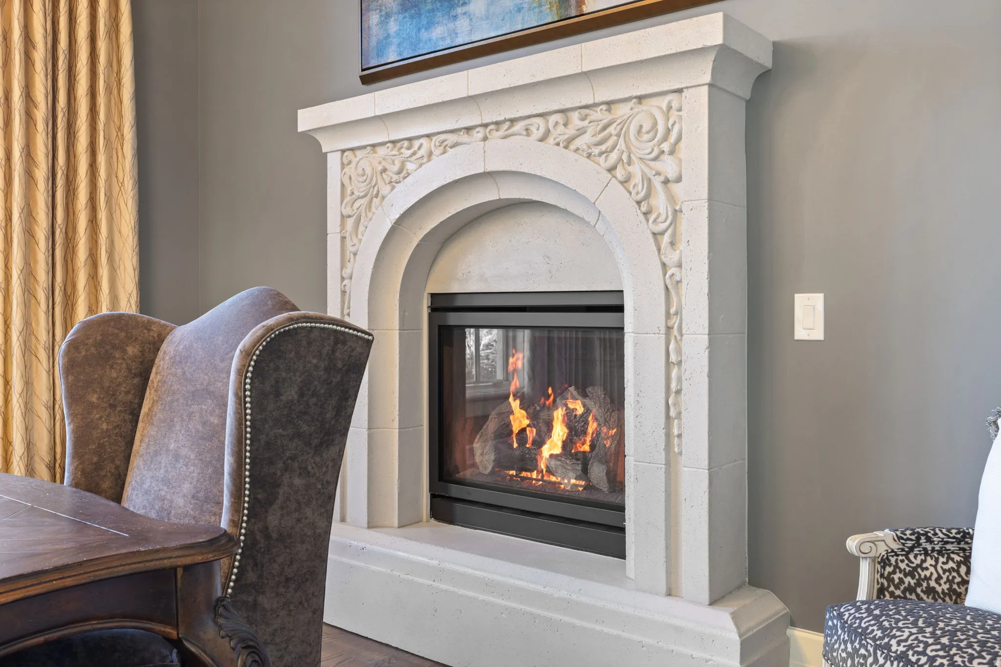 Detailed view of a glass covered fireplace