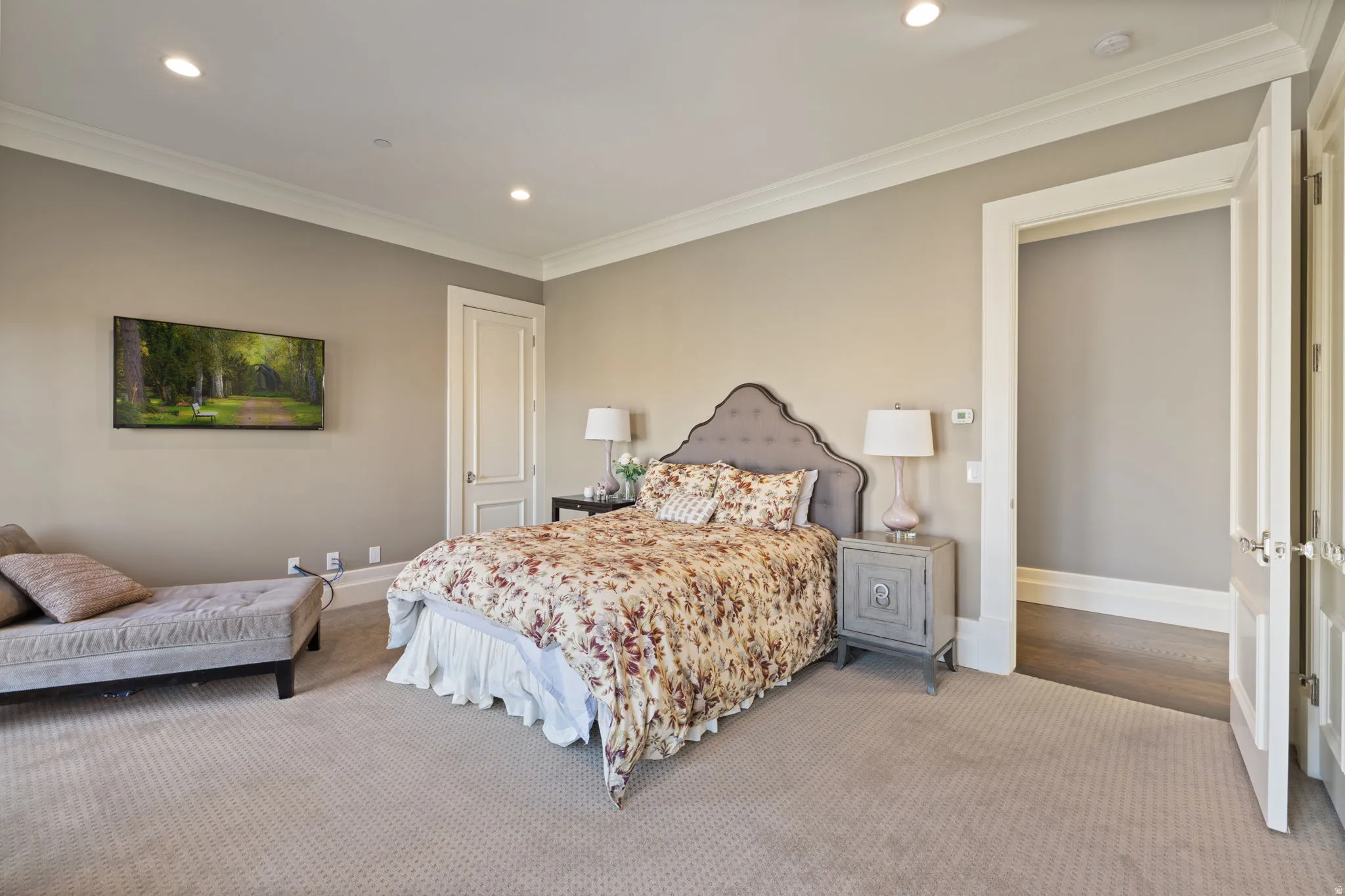 Carpeted bedroom featuring ornamental molding and recessed lighting