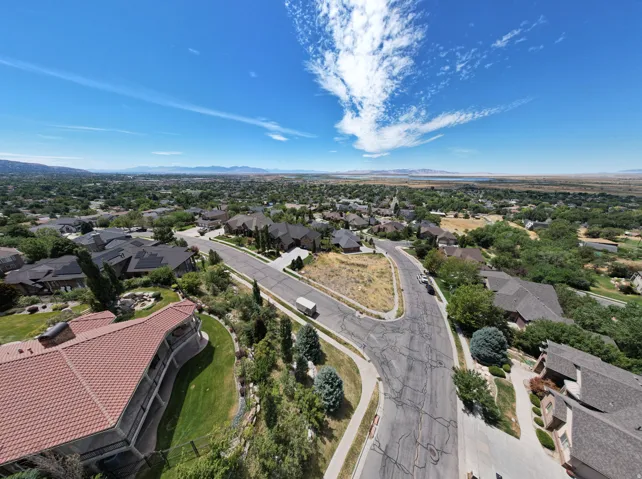 Aerial perspective of suburban area featuring mountains