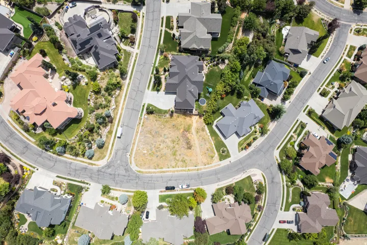 Aerial overview of property's location with nearby suburban area