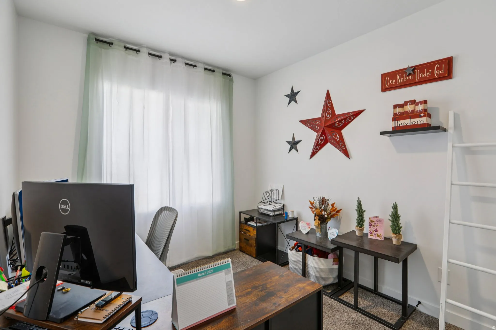 Home office featuring carpet floors