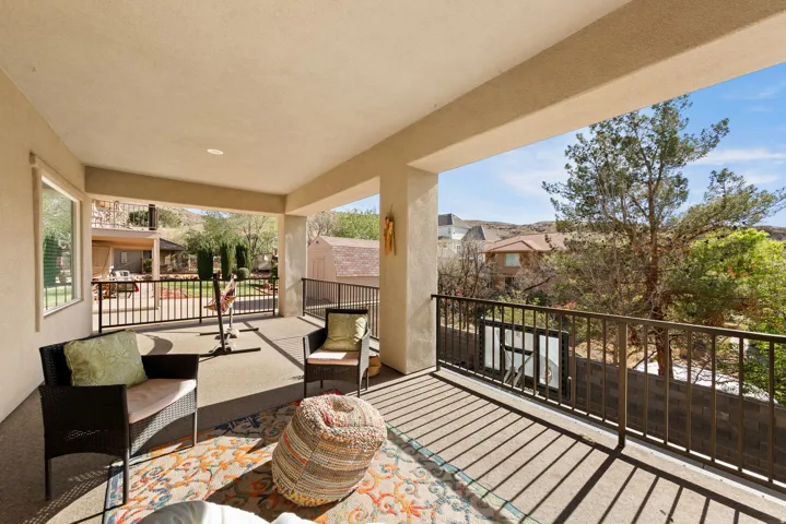 Balcony with a residential view and outdoor lounge area
