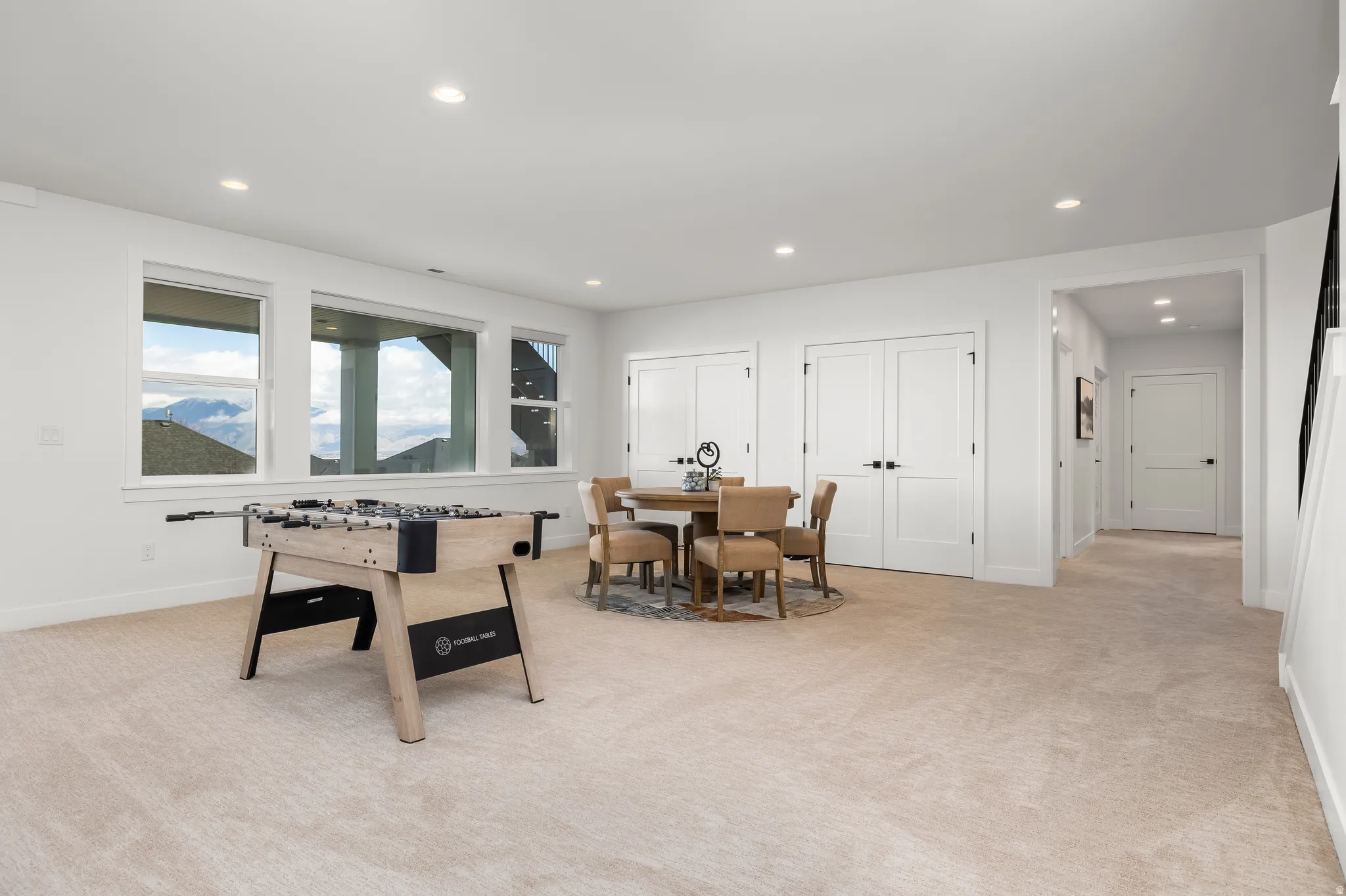 Game room featuring light carpet and recessed lighting