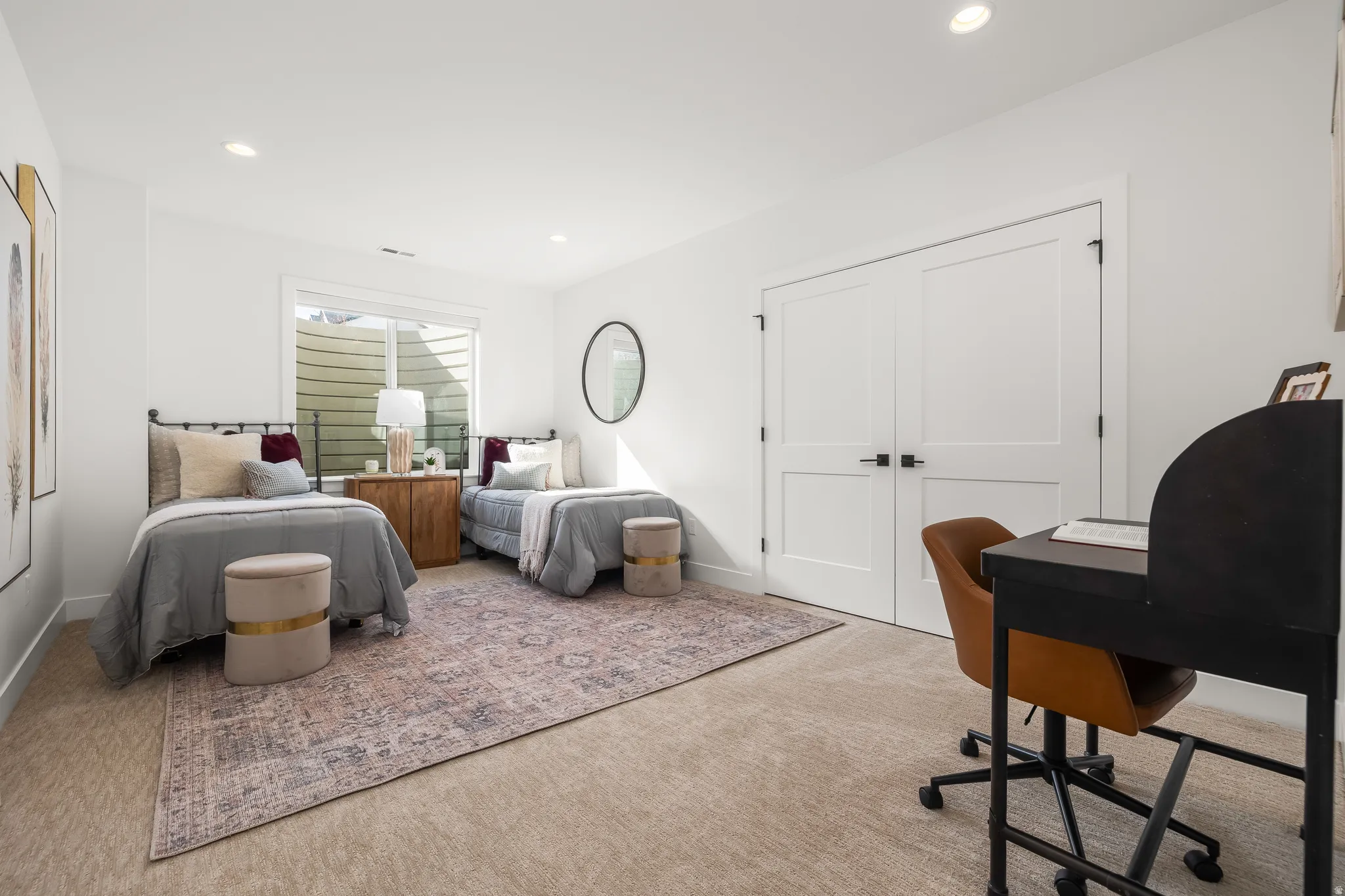 Carpeted bedroom featuring recessed lighting, an office area, and a closet