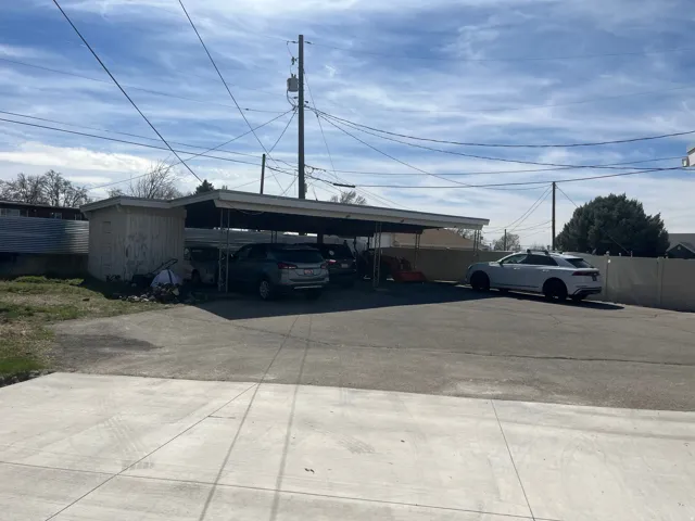 Exterior space featuring a carport
