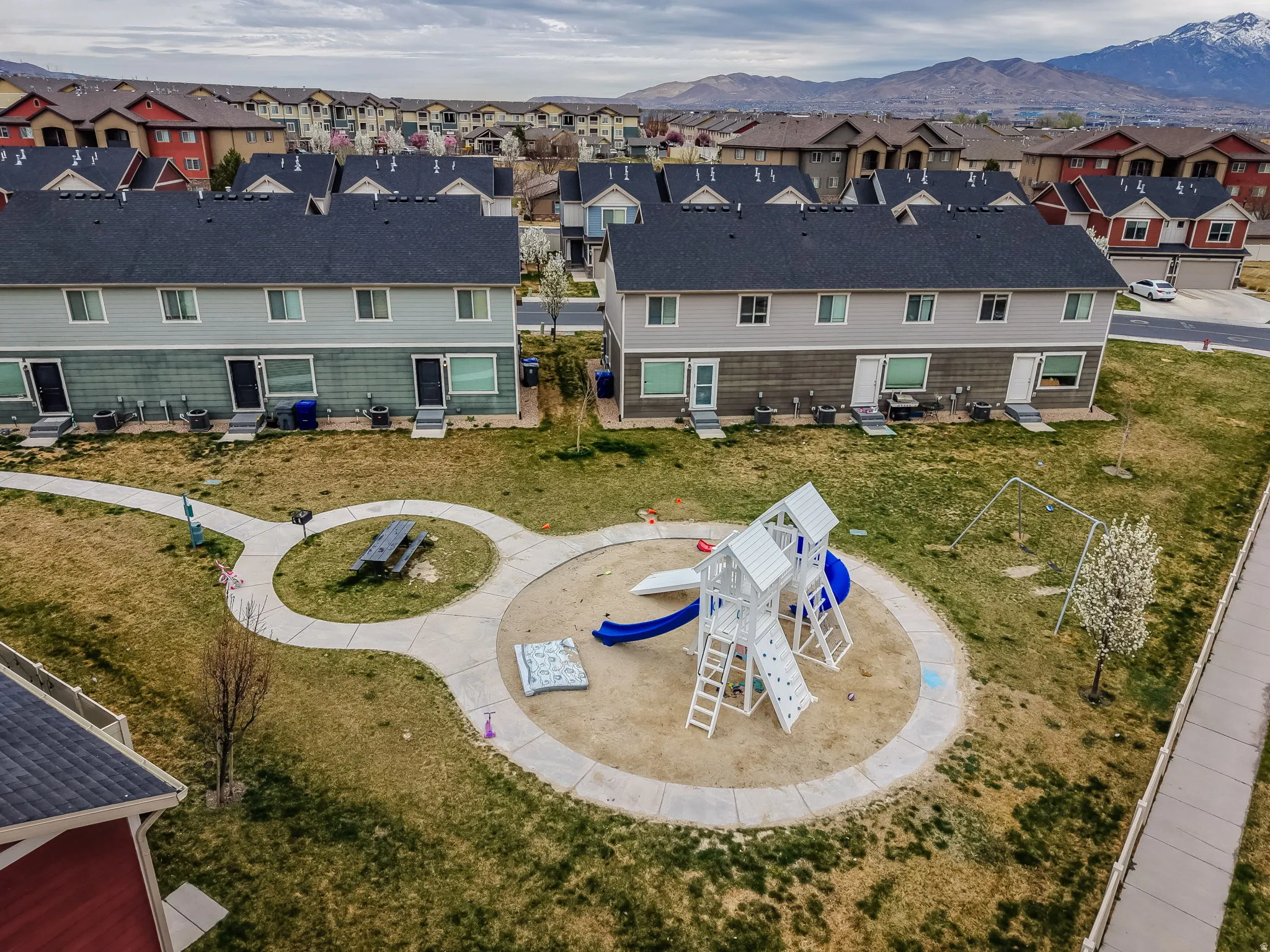 Aerial view of residential area with a mountain backdrop