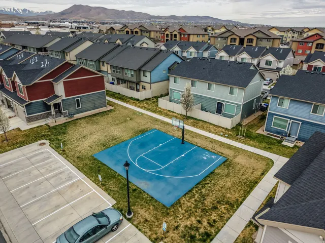 Aerial view of residential area with a mountainous background