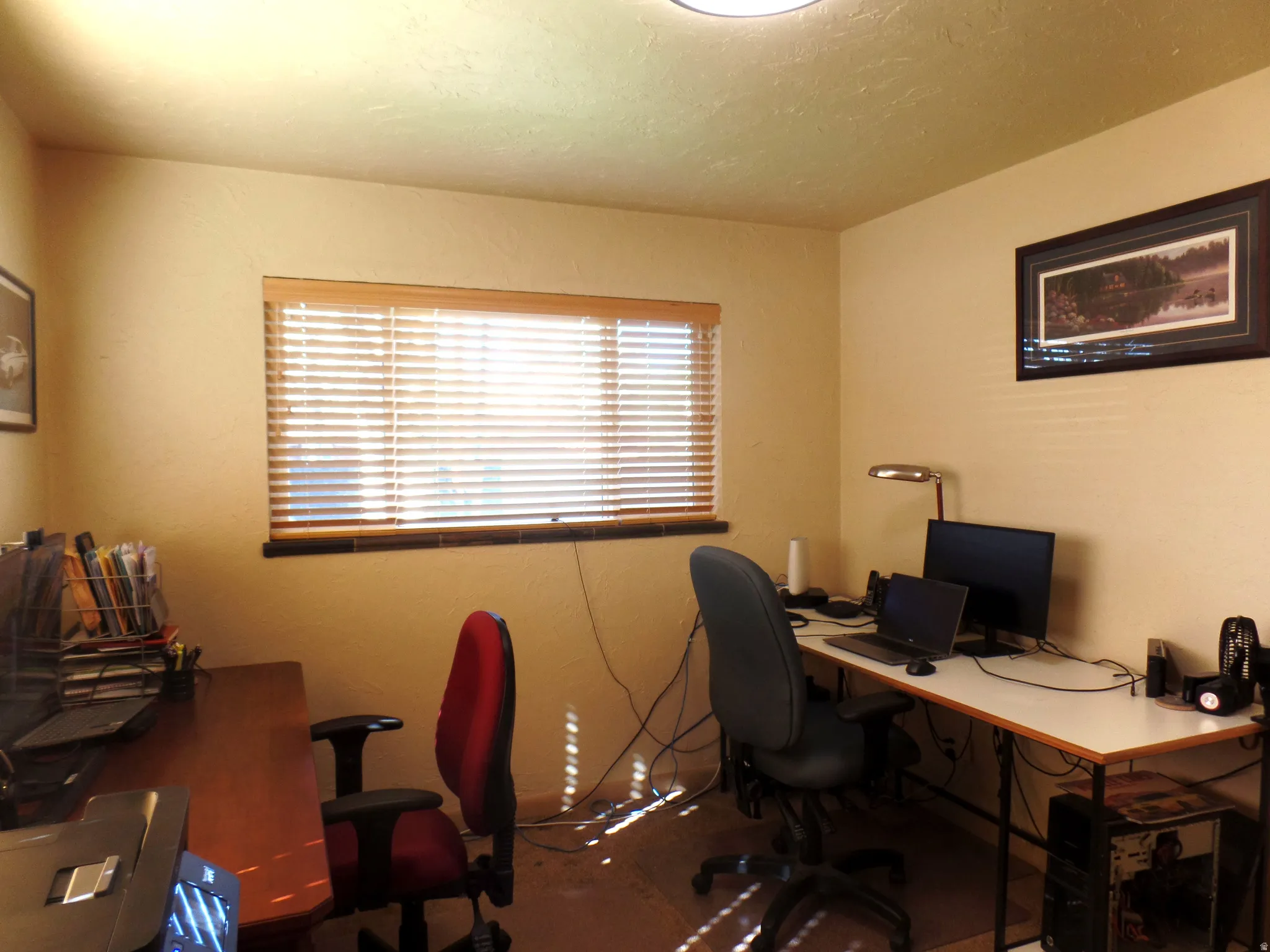 Bedroom/Office featuring a textured ceiling